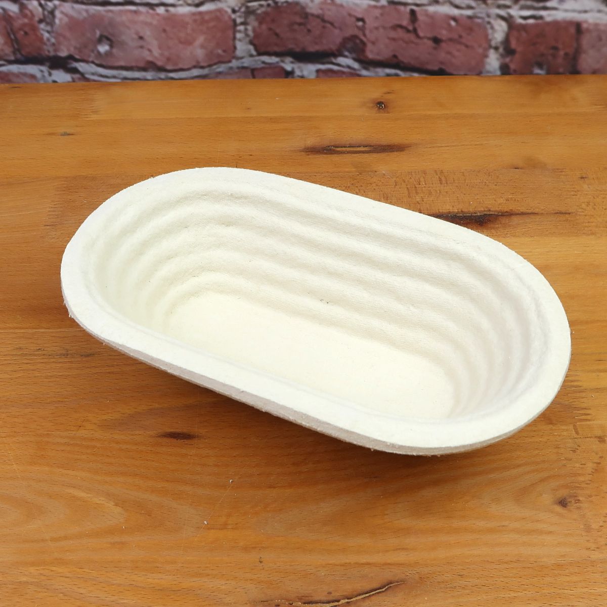 Gärkorb aus Holzschliff lang gerillt für 500g Teig